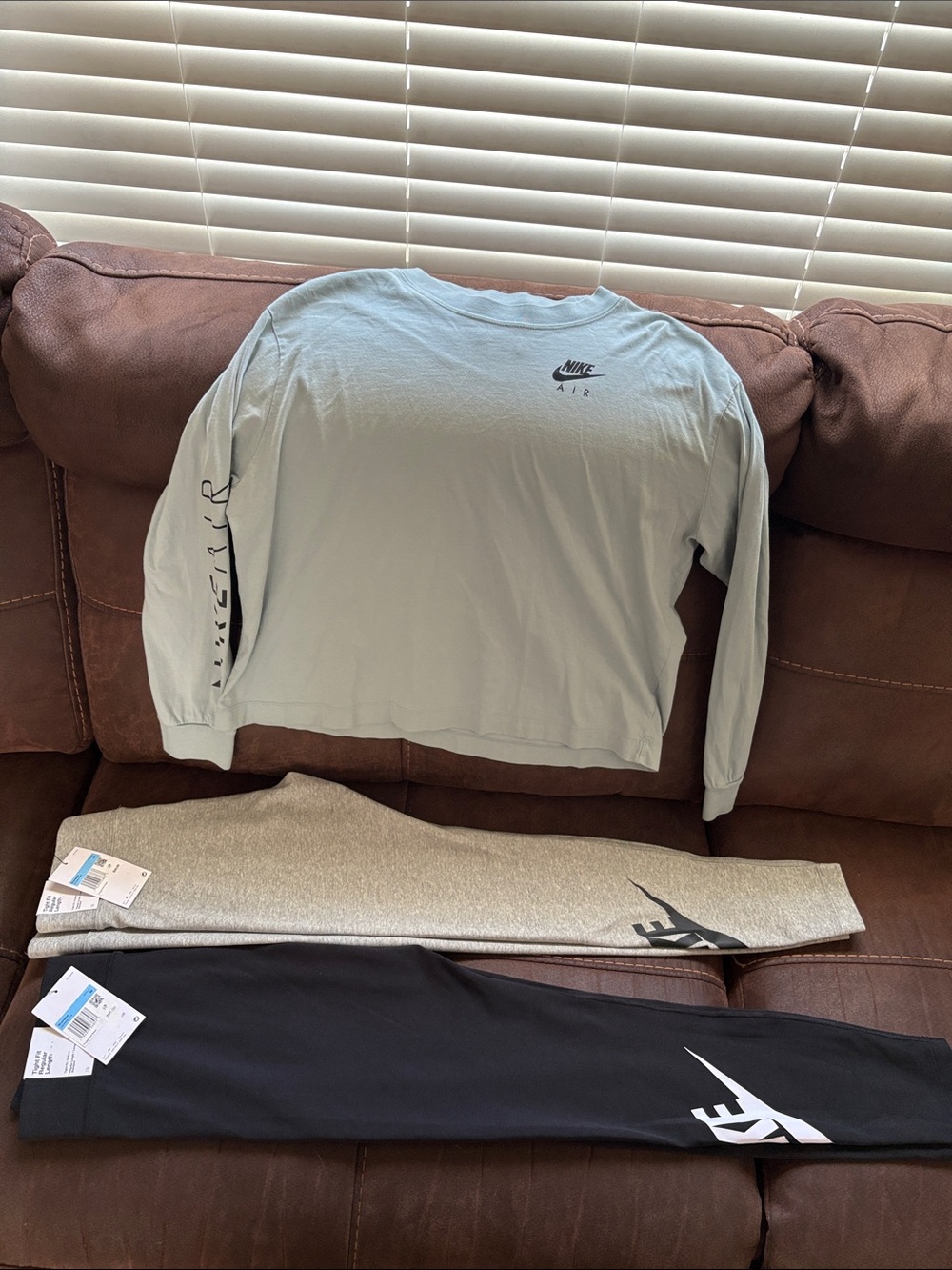 Nike womens Pale Blue Long-Sleeve Crew Shirt and two pairs of Leggings